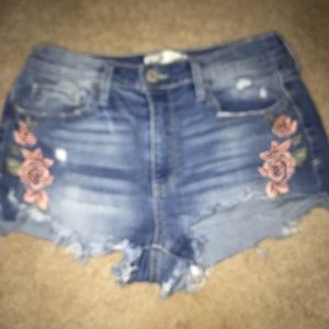 jean shorts with flower design